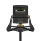 Matrix Performance Upright Cycle with black frame, digital console displaying workout metrics, and gold-accented handlebars o