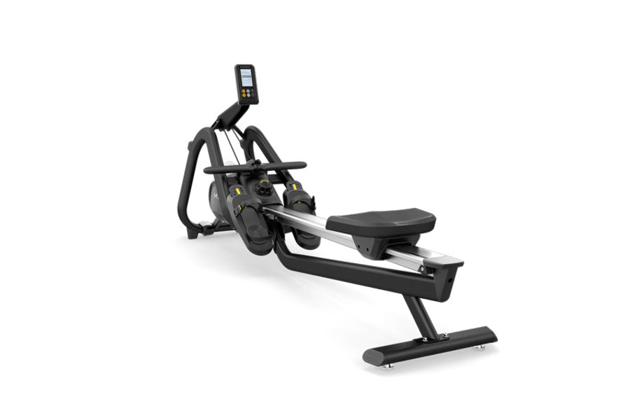 Black and silver rowing machine with digital display console, foot pedals, and black padded seat on white background