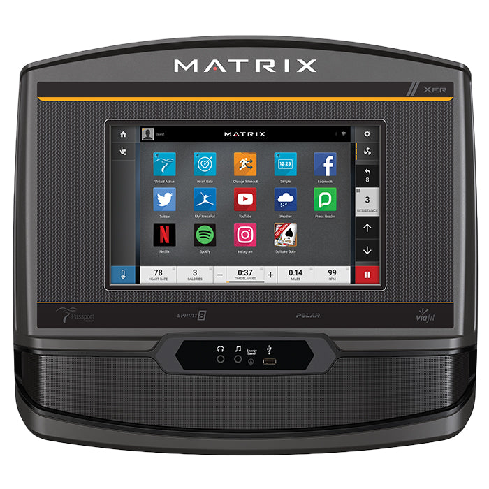 Matrix T75 treadmill with black frame, touchscreen display showing fitness app icons, and control panel with buttons on white