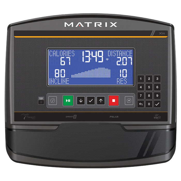 Matrix T75 Treadmill console displaying workout metrics including calories, distance, incline, and heart rate on blue screen 