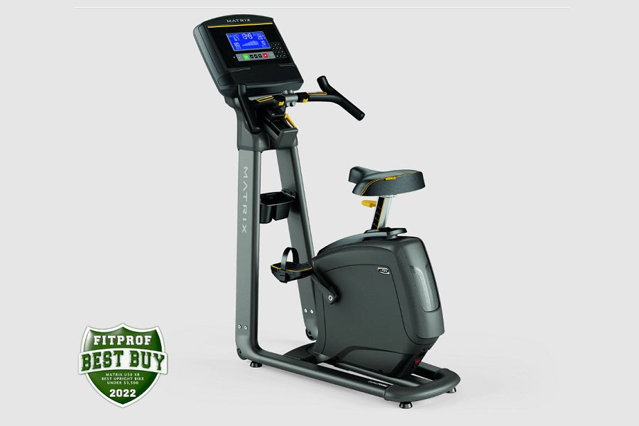 Matrix U50 upright exercise bike with black seat, gray frame, digital display console, and hand grips on white background