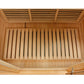 Interior view of wooden sauna showing cedar bench seating and slatted ceiling ventilation