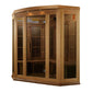 Maxxus Chaumont Edition corner infrared sauna with natural wood frame, glass doors, and vertical heating panels on white back