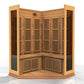Cedar corner infrared sauna with vertical slat design, bench seating, louvered vents, and glass door panels on white backgrou
