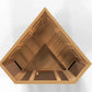 Wooden sauna interior with pyramid roof, viewing angle showing cedar construction, ventilation grilles, benches, and heating 