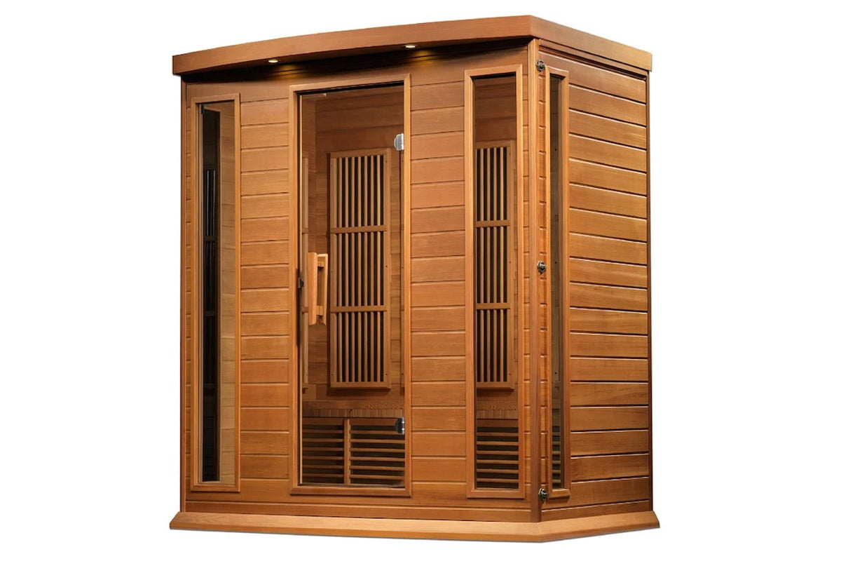 Cedar wood infrared sauna cabin with glass doors, two vertical heater panels, horizontal wood siding, and overhead lighting o