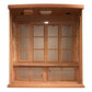 Cedar wood sauna with four glass doors and metal vents, interior view showing wooden bench seating and control panel on white