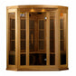 Natural wood corner infrared sauna with tempered glass doors and panels, featuring vertical carbon heating elements and bench