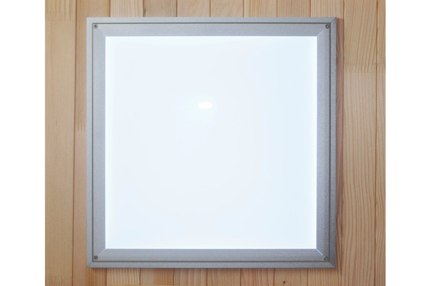 Gray aluminum framed mirror with white glass surface mounted on wooden wall background