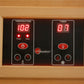 Signature Saunas digital control panel with temperature and timer displays, power and heat buttons, mounted in light wood fra