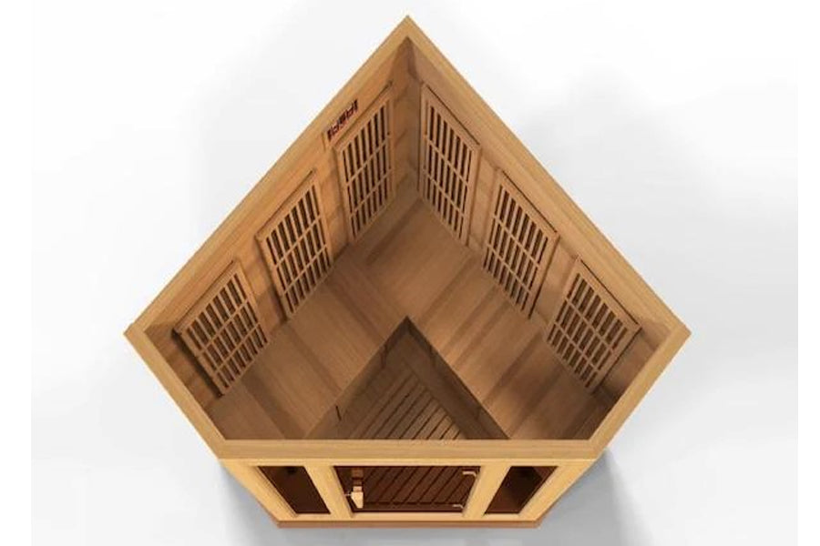 Wooden 3-person corner sauna with peaked roof, ventilation grilles on interior walls, and dark glass front panel on white bac