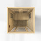 Light wood far-infrared sauna interior with wooden benches, ceiling heaters, and ventilation grilles, viewed from above