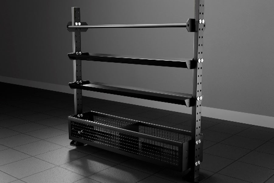 Black metal storage rack with four horizontal shelves and perforated base, adjustable arms on steel uprights