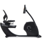 NordicTrack black recumbent exercise bike with curved seat, handlebars, and digital display console on white background