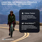 Person in green puffy jacket and burgundy leggings riding teal exercise bike on mountain road with text describing iFIT smart