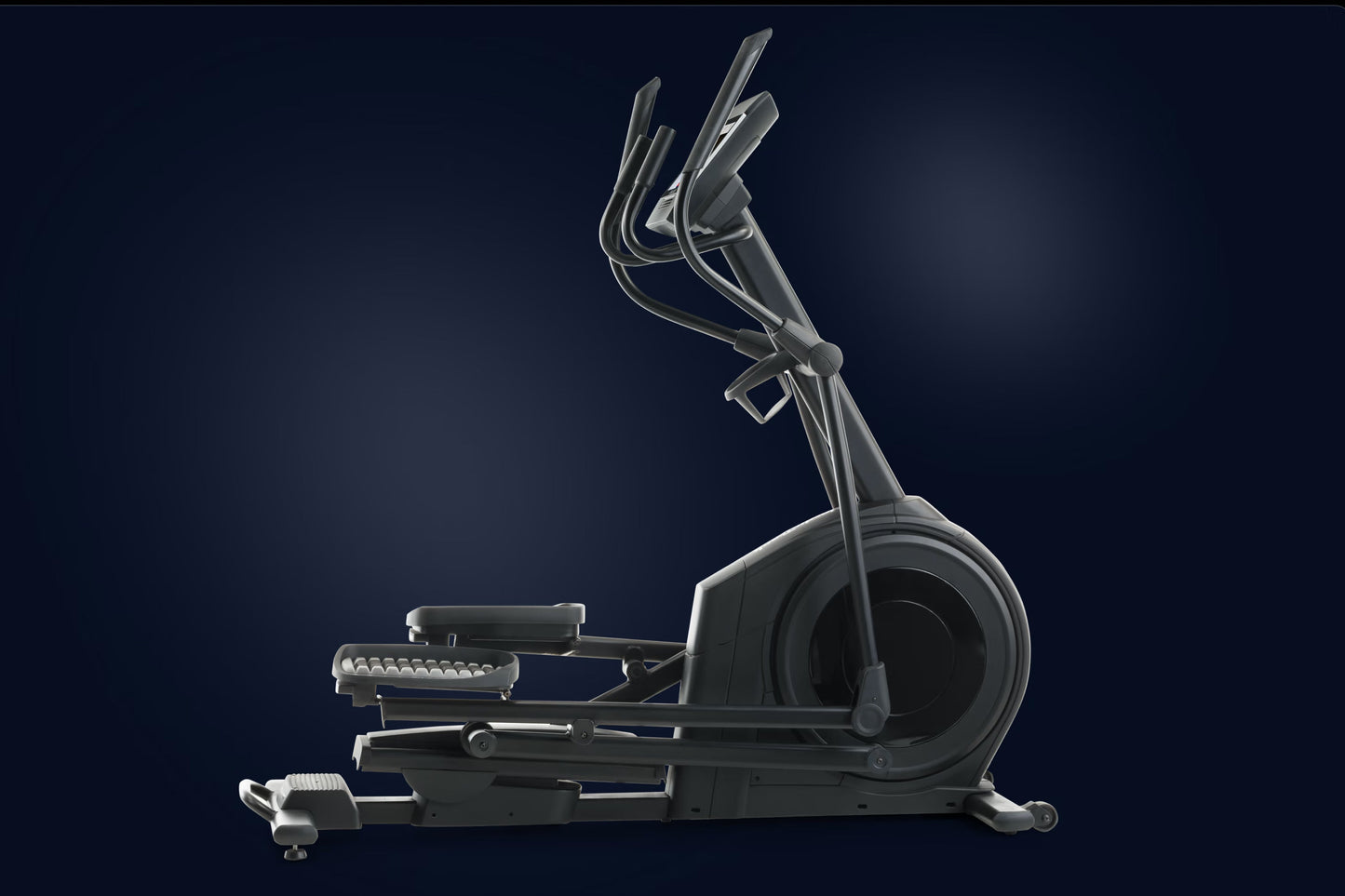 NordicTrack AirGlide 14i elliptical machine with black frame, large wheel, dual handlebars, and foot pedals on dark blue back