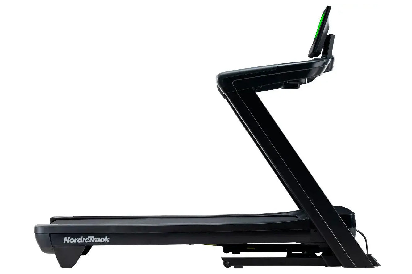 NordicTrack Commercial 1250 black treadmill with green accent on incline lever, shown on white background