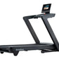 NordicTrack Commercial 1250 black treadmill with touchscreen display showing workout video, on white background