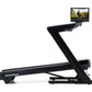 NordicTrack Commercial 1750 black treadmill with attached tablet display showing workout video, on white background