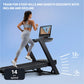 Woman in gray sports bra and leggings running on black NordicTrack treadmill with screen displaying hill workout, 12% incline