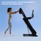 Woman in white sports bra and leggings using folded black NordicTrack treadmill on blue background