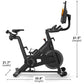 Black NordicTrack stationary exercise bike with digital display screen, curved handlebars, and footrests, shown with dimensio