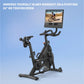 Black NordicTrack stationary bike with pivoting 24-inch HD touchscreen displaying cycling workout video, on blue background