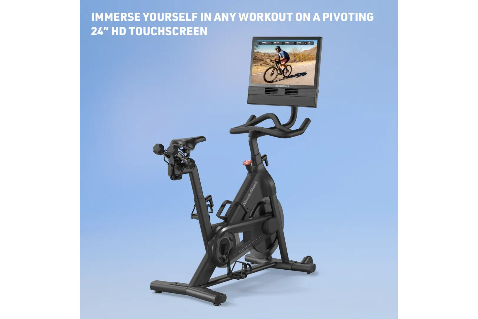 Black NordicTrack stationary bike with pivoting 24-inch HD touchscreen displaying cycling workout video, on blue background
