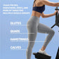 Woman wearing navy sports bra and gray leggings using NordicTrack step climber against blue background