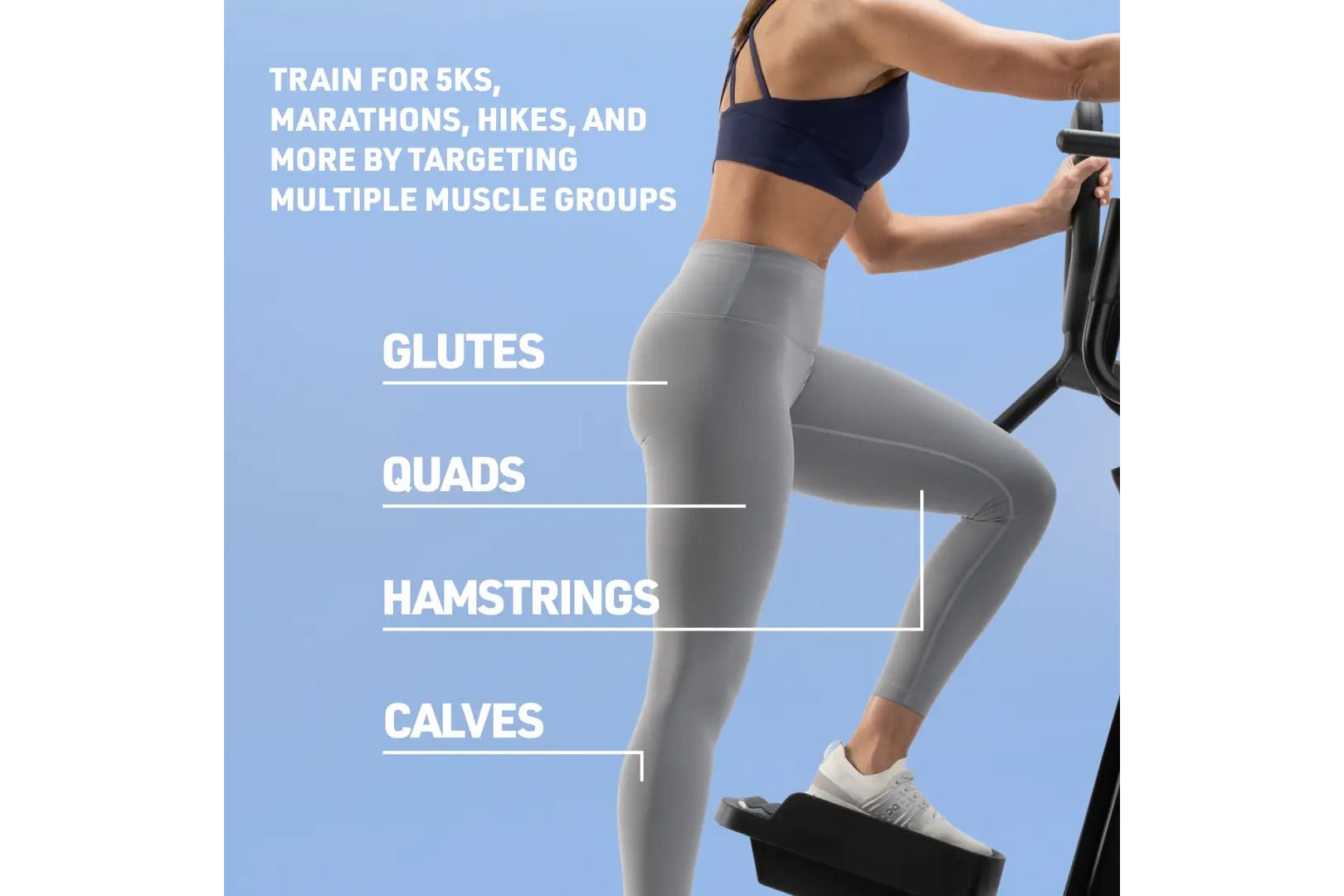 Woman wearing navy sports bra and gray leggings using NordicTrack step climber against blue background