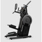 Black NordicTrack step climber with digital display, moving handlebars, and foot pedals on white background