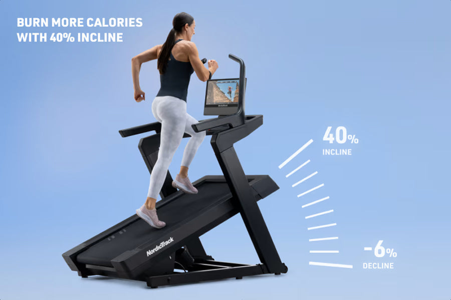 Woman running on black NordicTrack incline treadmill with screen display, white background, demonstrating 40% incline feature