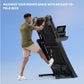 Man in olive shirt and beige shorts using black NordicTrack treadmill with digital display, folded upright position on blue b