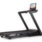 NordicTrack T-Series 16 treadmill with black frame, running deck, and attached digital display console showing beach scene on