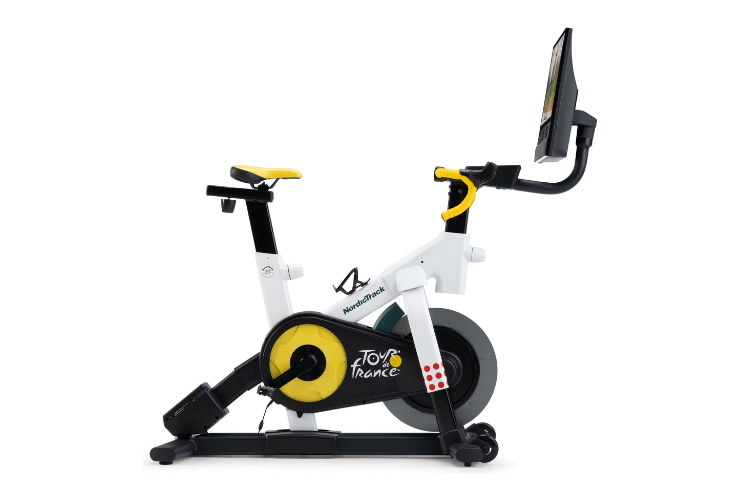 NordicTrack Tour de France stationary bike with white frame, black and yellow accents, yellow resistance wheel, and digital d