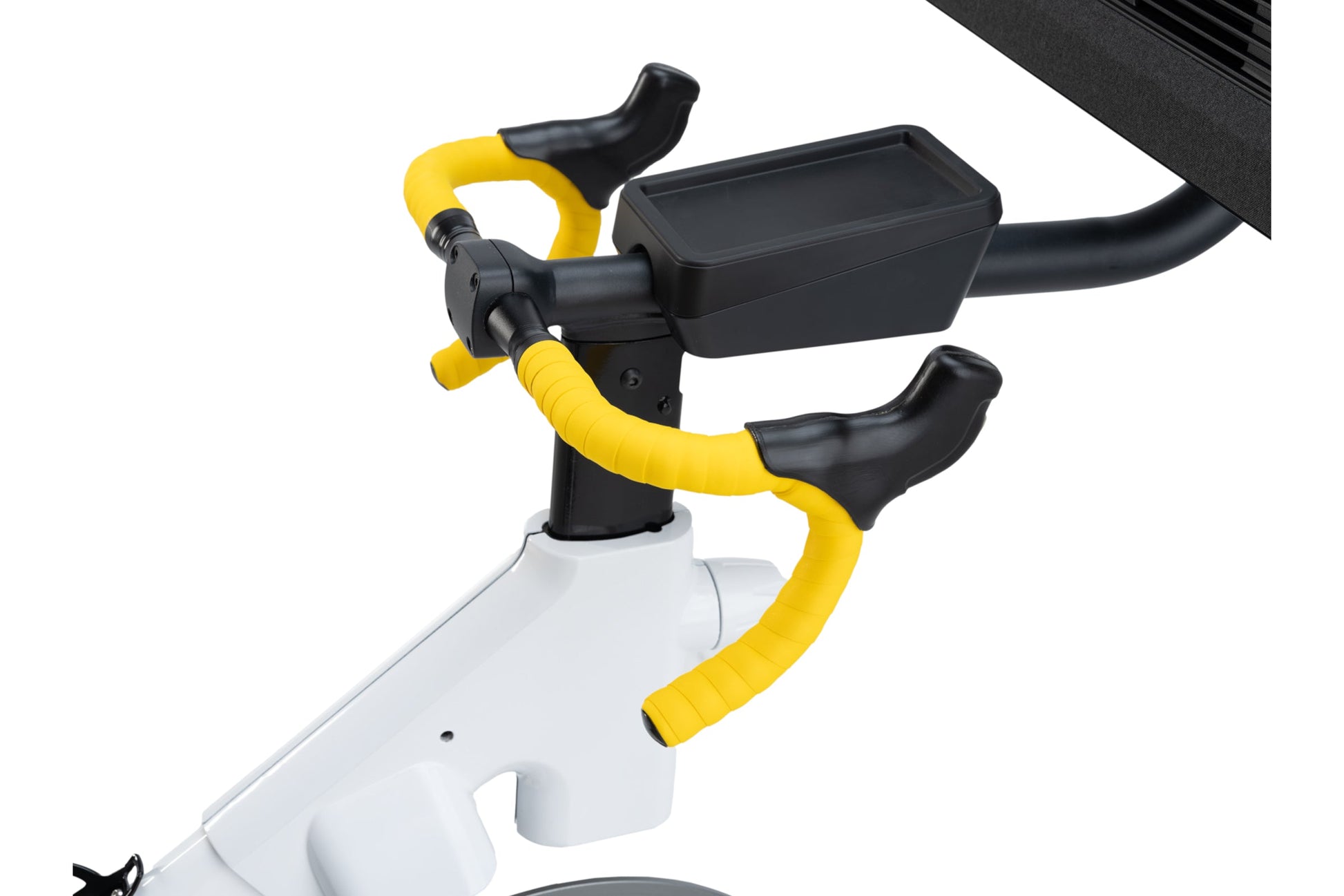 NordicTrack Tour de France indoor bike with white frame, black seat and handlebars, yellow handlebar tape, and black display 