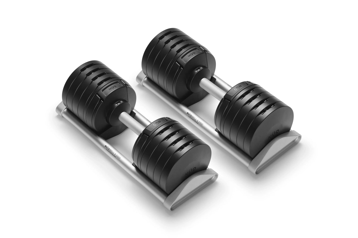 Pair of Nüobell adjustable dumbbells with black rubber heads and silver handles on gray base, flat lay on white background