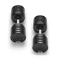 Pair of black adjustable dumbbells with ribbed grip handles and white connectors on white background