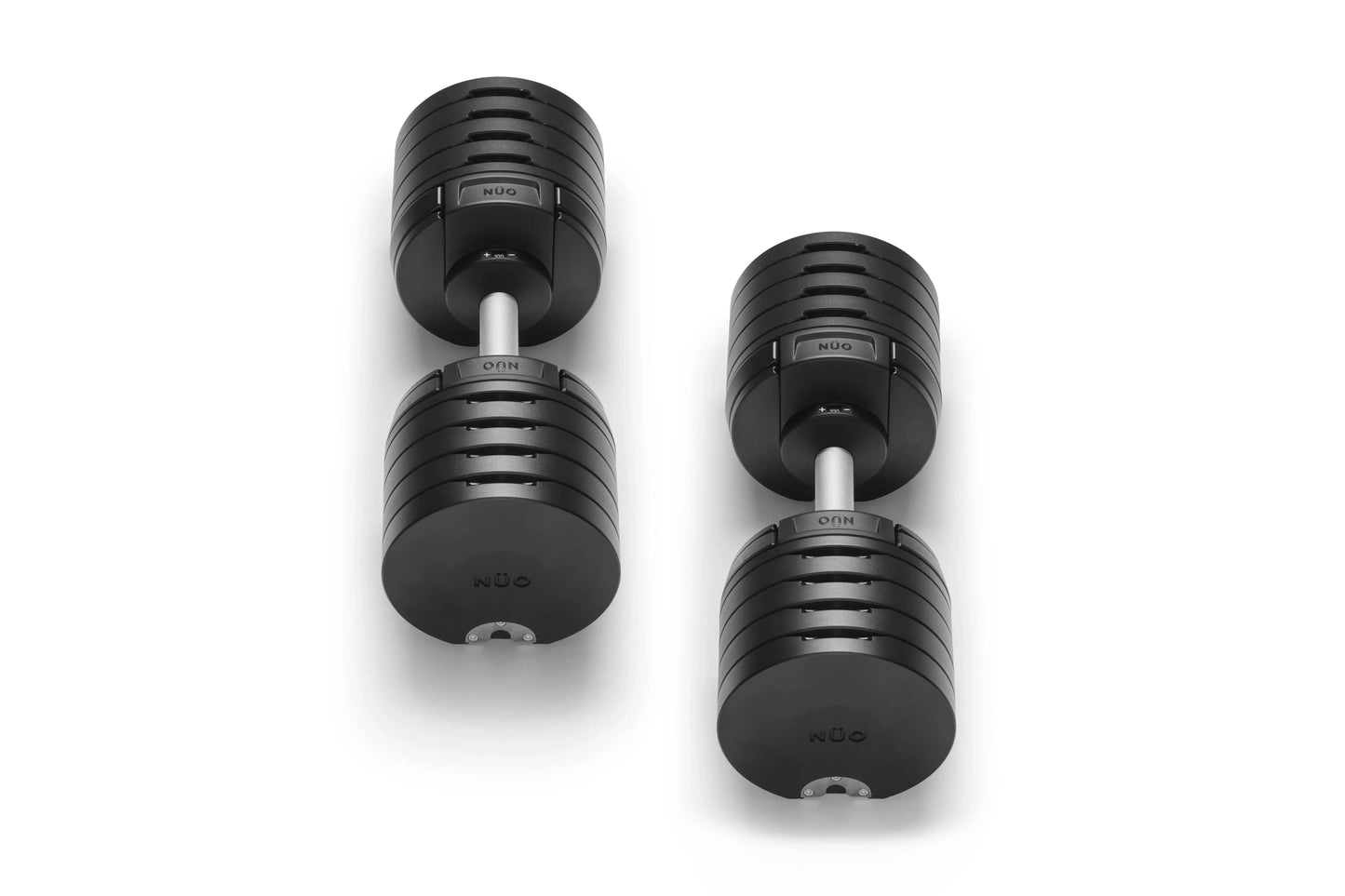 Pair of black adjustable dumbbells with ribbed grip handles and white connectors on white background