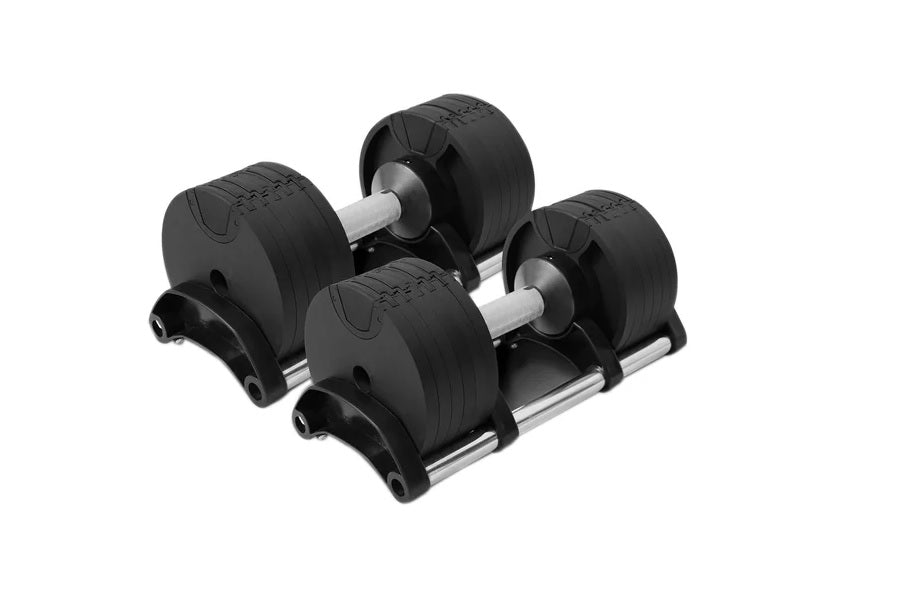Pair of black adjustable dumbbells with silver handles and weight plates, on white background