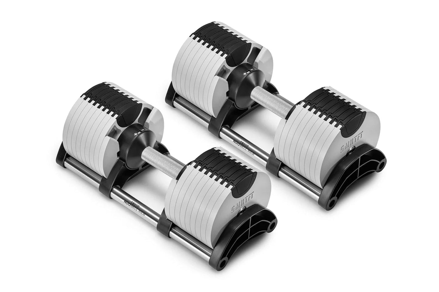 Set of three adjustable dumbbells with white and black weight plates and metallic handles on white background