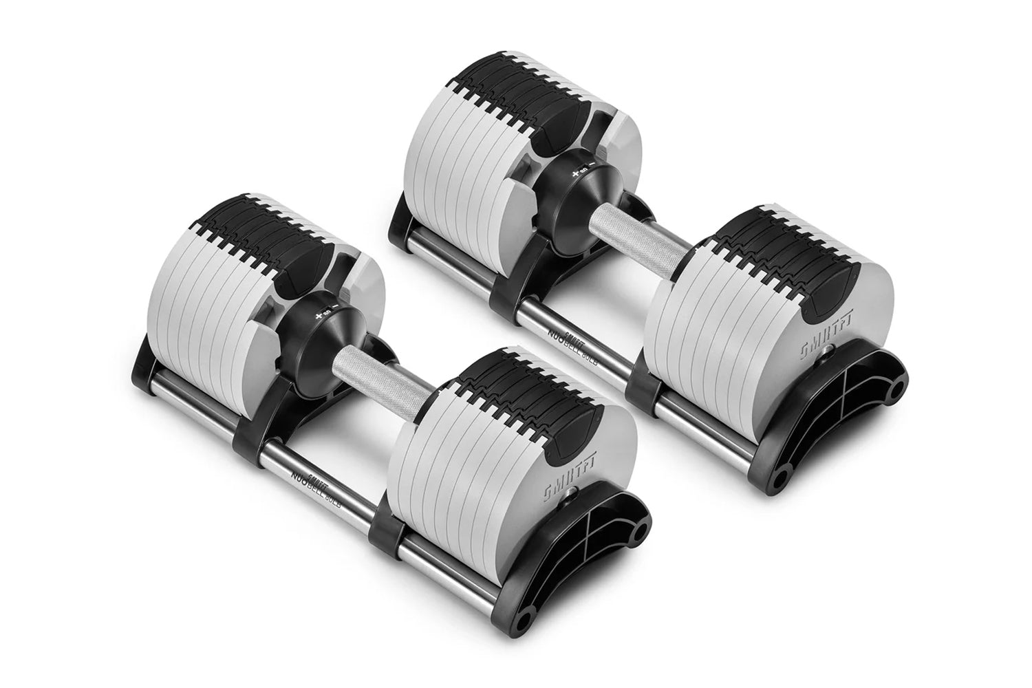 Set of three adjustable dumbbells with white and black weight plates and metallic handles on white background