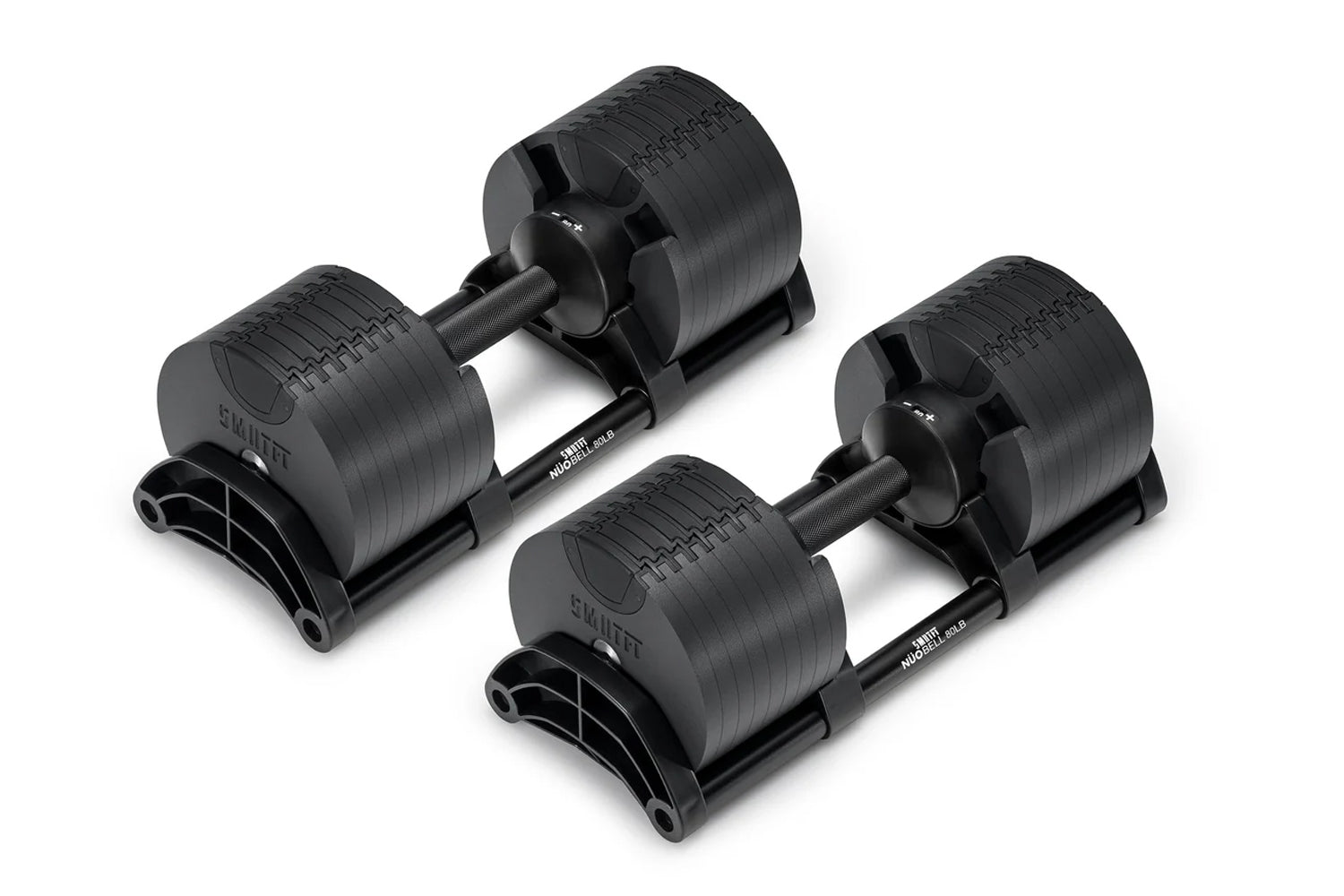 Pair of matte black Nüobell adjustable dumbbells with textured weight plates and black handles on white background