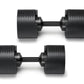 Pair of matte black adjustable dumbbells with ribbed weight plates and black handles on white background