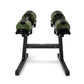 Pair of olive green and black adjustable dumbbells mounted on black stand, flat lay on white background