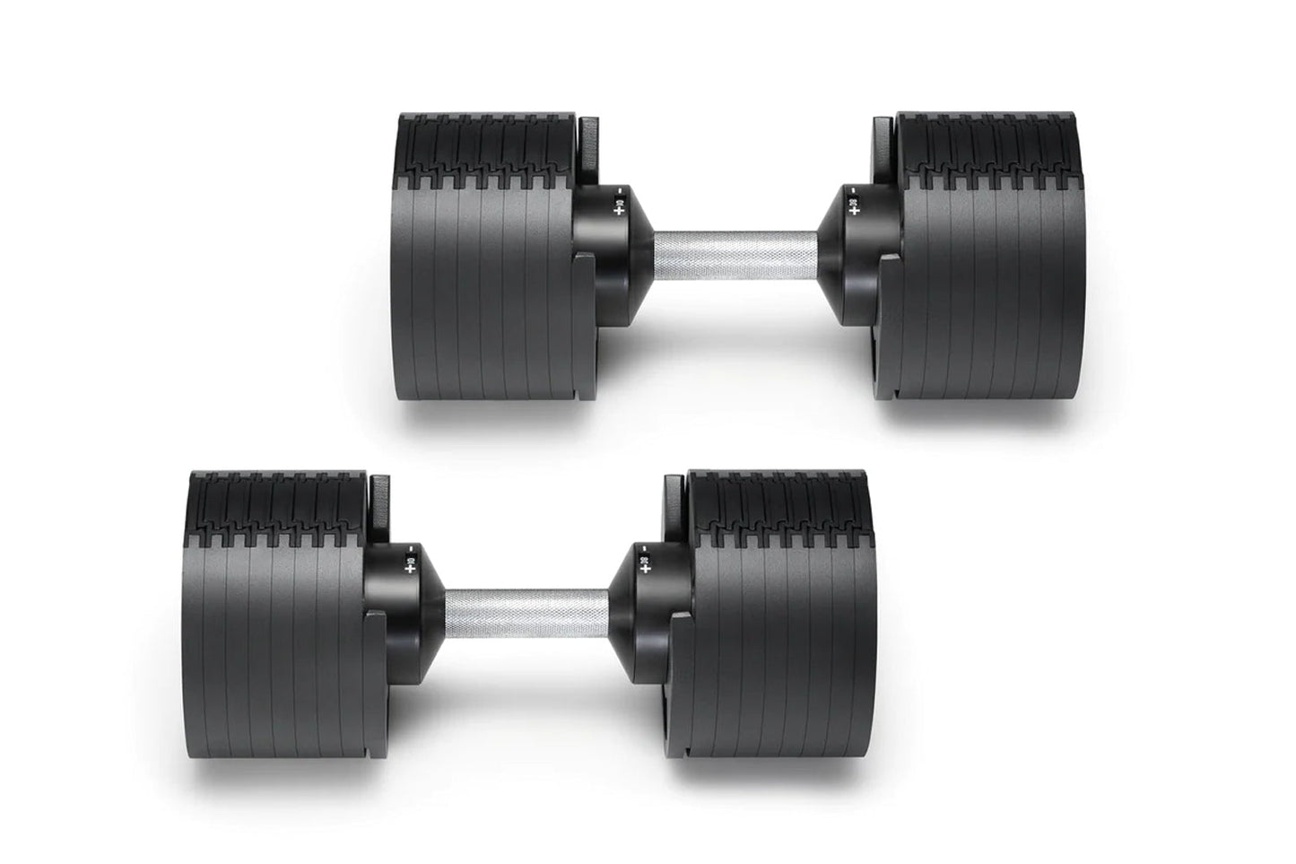 Pair of black adjustable dumbbells with ribbed rubber heads and gray metal handles on white background