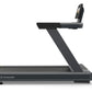 Octane OC100 black treadmill with 10-inch touchscreen console on angled arm, front-facing view