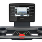 Octane OC100 treadmill with 10-inch black touchscreen console displaying fitness metrics and training programs, front view on