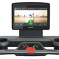 Octane OC160 treadmill with 16-inch black touchscreen console displaying fitness interface, dual cup holders, and red safety 