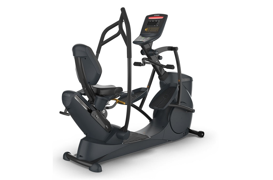Black recumbent elliptical machine with digital display console, dual pedals, and padded seat on white background